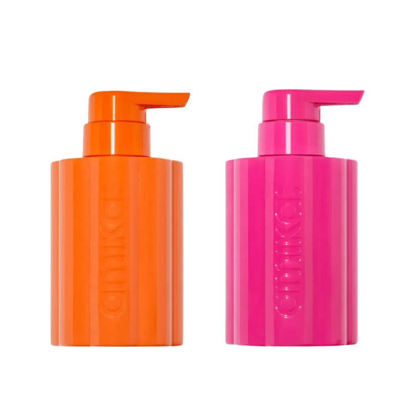 amika tritan refillable shampoo + conditioner bottle